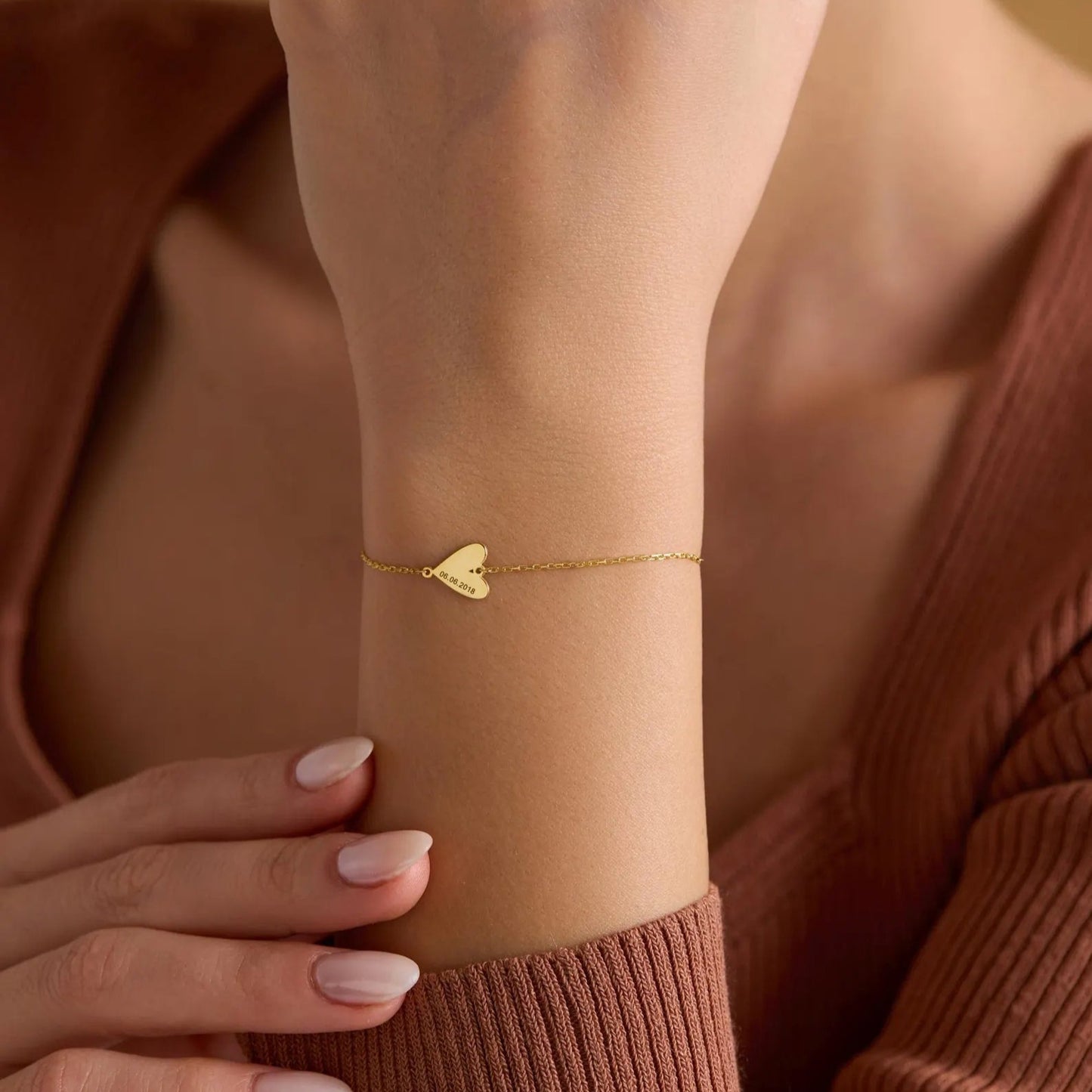 Pulsera personalizada con corazón grabado