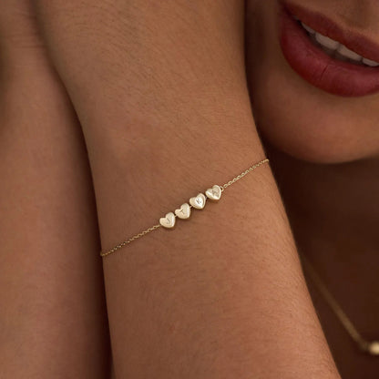 Pulsera personalizada con inicial y corazón